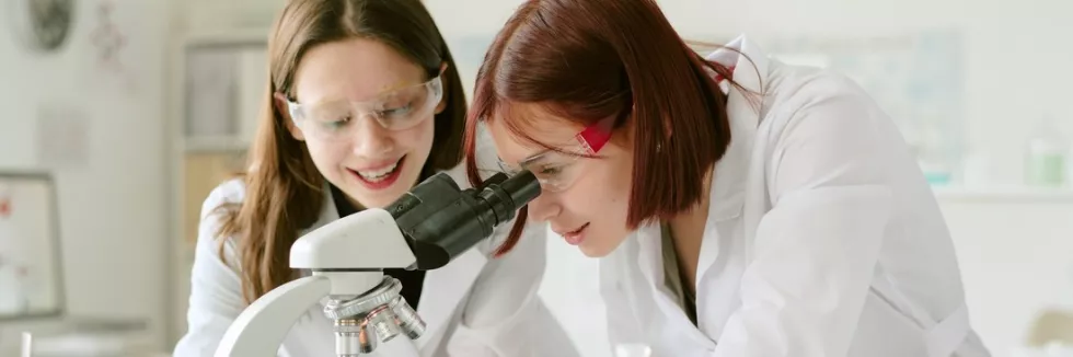 Advanced-Nano-and-Biomaterials-MONABIPHOT-Masters-test-two-young-female-scientists-working-together-in-laboratory-u