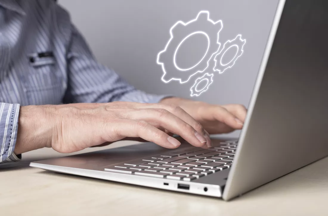 man-installing-configuring-system-settings-laptop-computer-repair-technical-support-concept-sysadmin-it-administrator-profession
