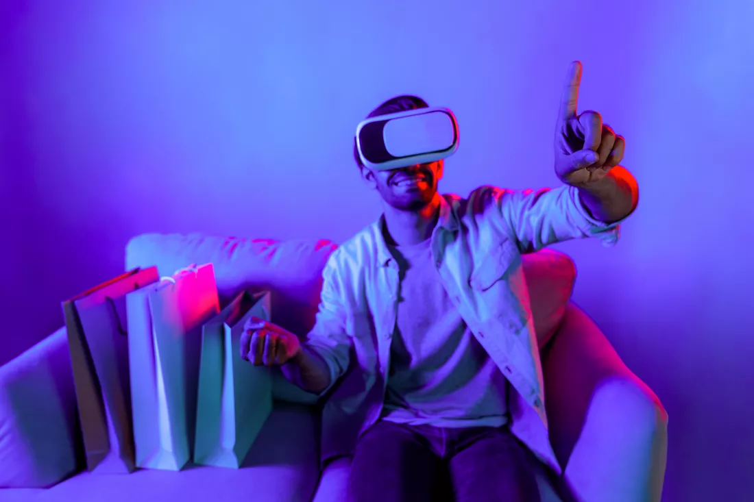 caucasian-man-with-vr-glass-choosing-program-while-sitting-sofa-deviation