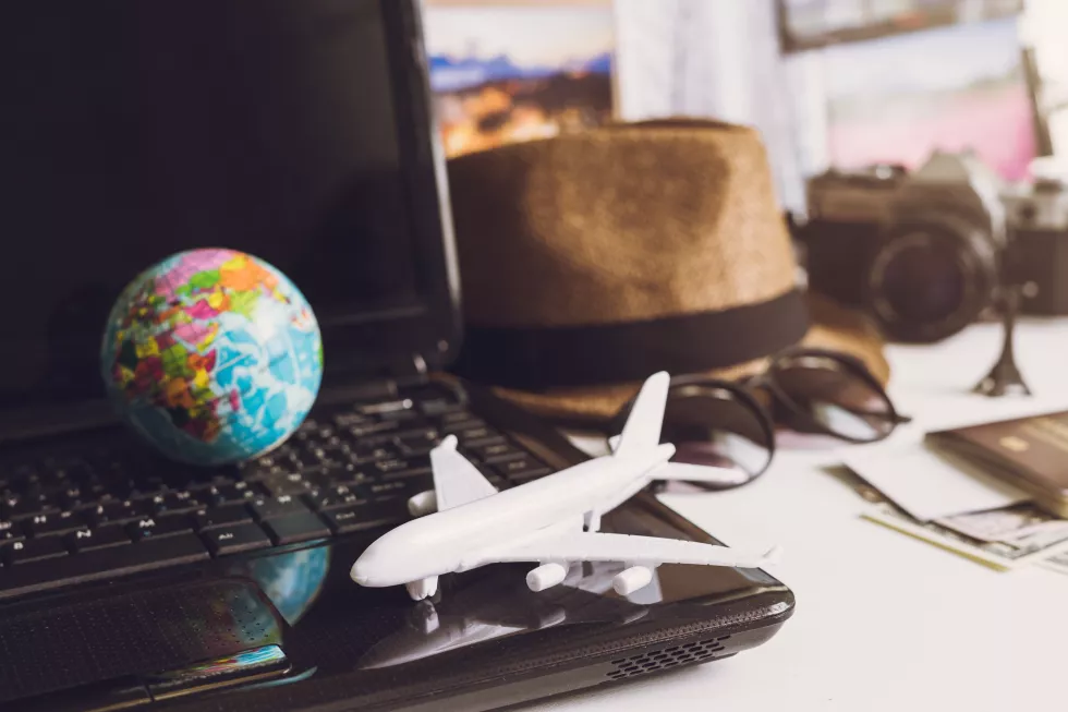 toy-airplane-laptop-keyboard-with-globe-camera