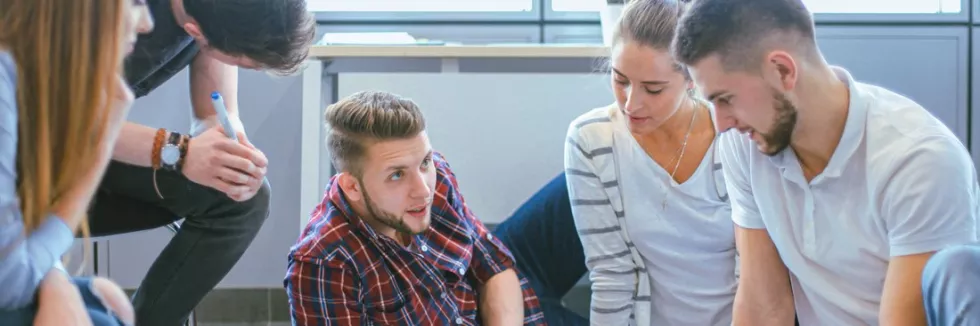 Cognitive-Science-Technology-Communication-Design-test-young-designers-making-sketches-in-office