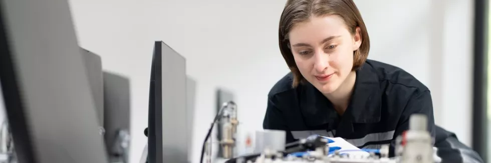 control-electronic-and-information-engineering-female-engineer-check-and-control-automation-robot