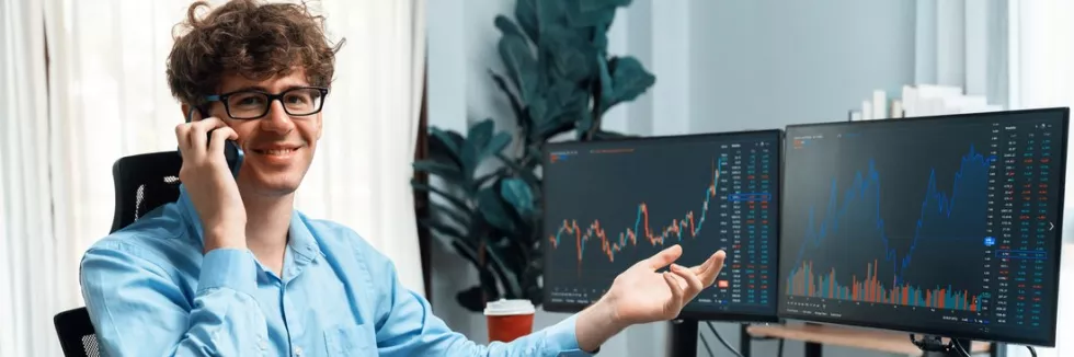 corporate-finance-financial-markets-profile-of-smiling-young-stock-trader-looking