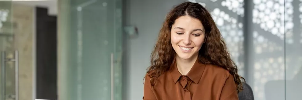 corporate-reporting-and-accounting-acca-track-z-accenture-young-businesswoman-smiling-organizing-and-reviewing