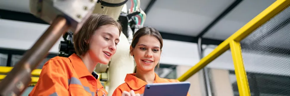 digital-and-sustainable-manufacturing-engineering-female-engineer-check-and-control-automation-robot
