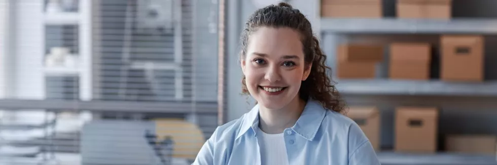 e-business-e-marketing-e-commerce-happy-young-female-manager-of-marketplace-looking