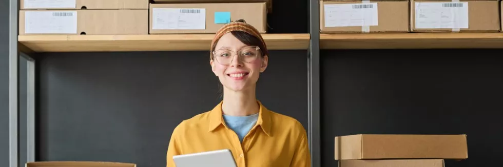 e-commerce-and-marketing-management-portrait-of-young-woman-smiling-at-camera