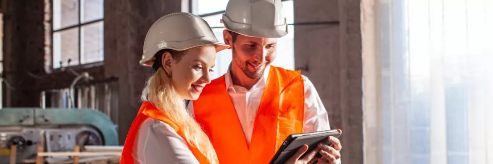 engineering-management-young-professional-people-with-helmets-working-in