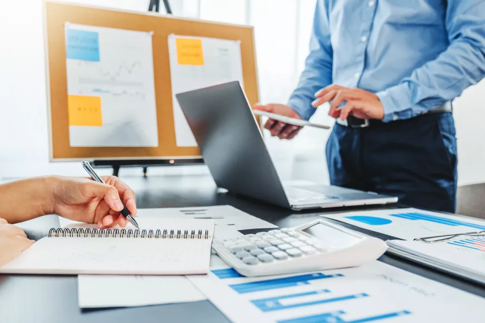 midsection-business-colleagues-working-office