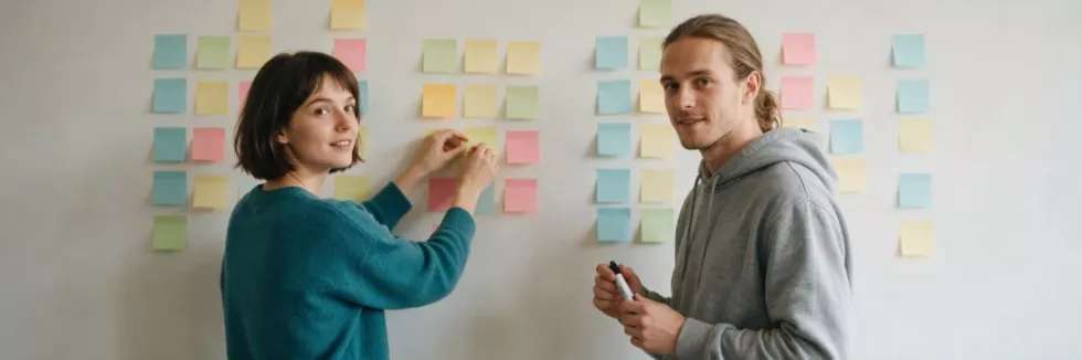 students-planning-a-project-with-sticky-notes